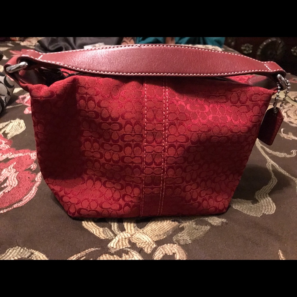 Coach Soho Signature top handle pouch
